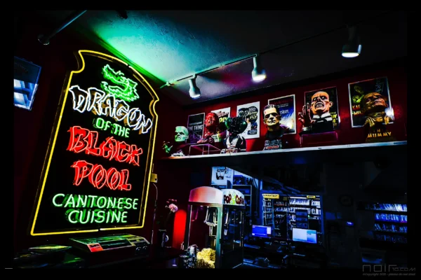 Dragon of the Black Pool neon glowing green inside Movie Madness — Noir10 handmade backlit print