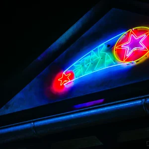 Yukon Tavern neon sign at night — Noir10 handmade LED backlit print