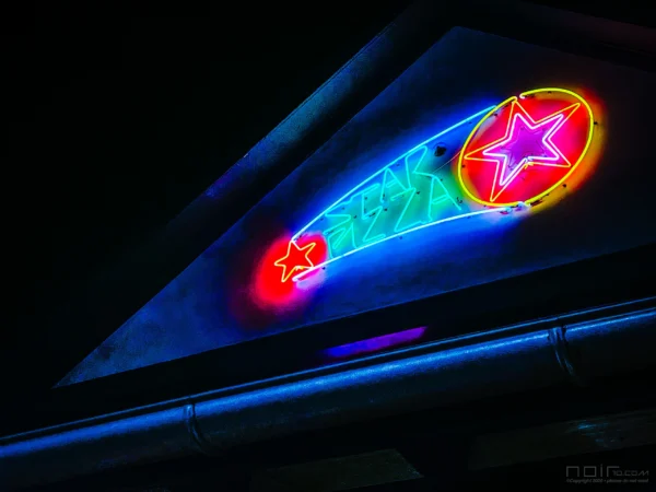 Yukon Tavern neon sign at night — Noir10 handmade LED backlit print