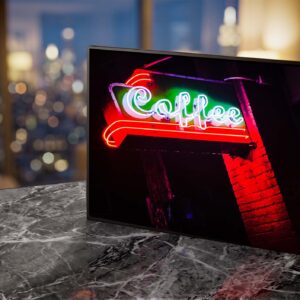 Stumptown Coffee neon sign glowing red at night living room — Noir10 handmade LED backlit print