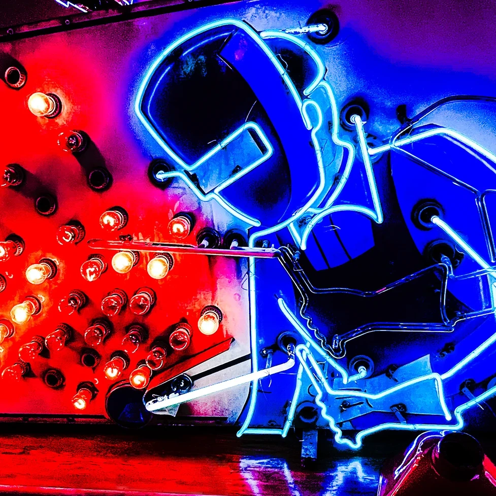 Welder neon sign, national neon museum, red and blue glow — Noir10 handmade LED backlit prints