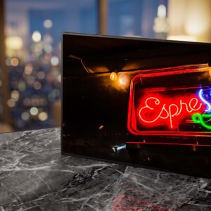 Coffee cart neon sign glowing red and green at night — Noir10 handmade LED backlit print