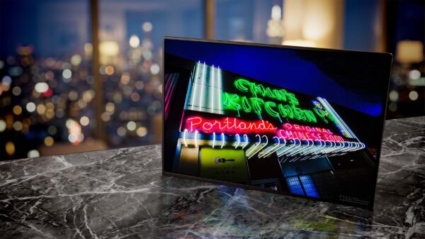 Chin's Kitchen neon sign glowing green at night — Noir10 handmade LED backlit print