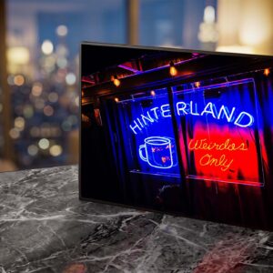 Hinterland coffee shop neon sign glowing red and blue at night — Noir10 handmade LED