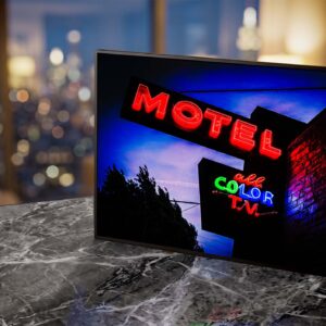 PDX motel neon sign print in living room at night — Noir10 handmade LED backlit print