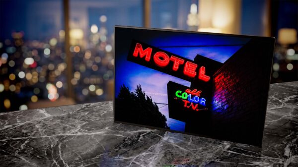 PDX motel neon sign print in living room at night — Noir10 handmade LED backlit print