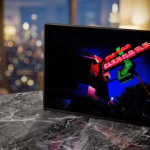 Tip Top neon sign glowing red and green at dusk — Noir10 handmade LED backlit print